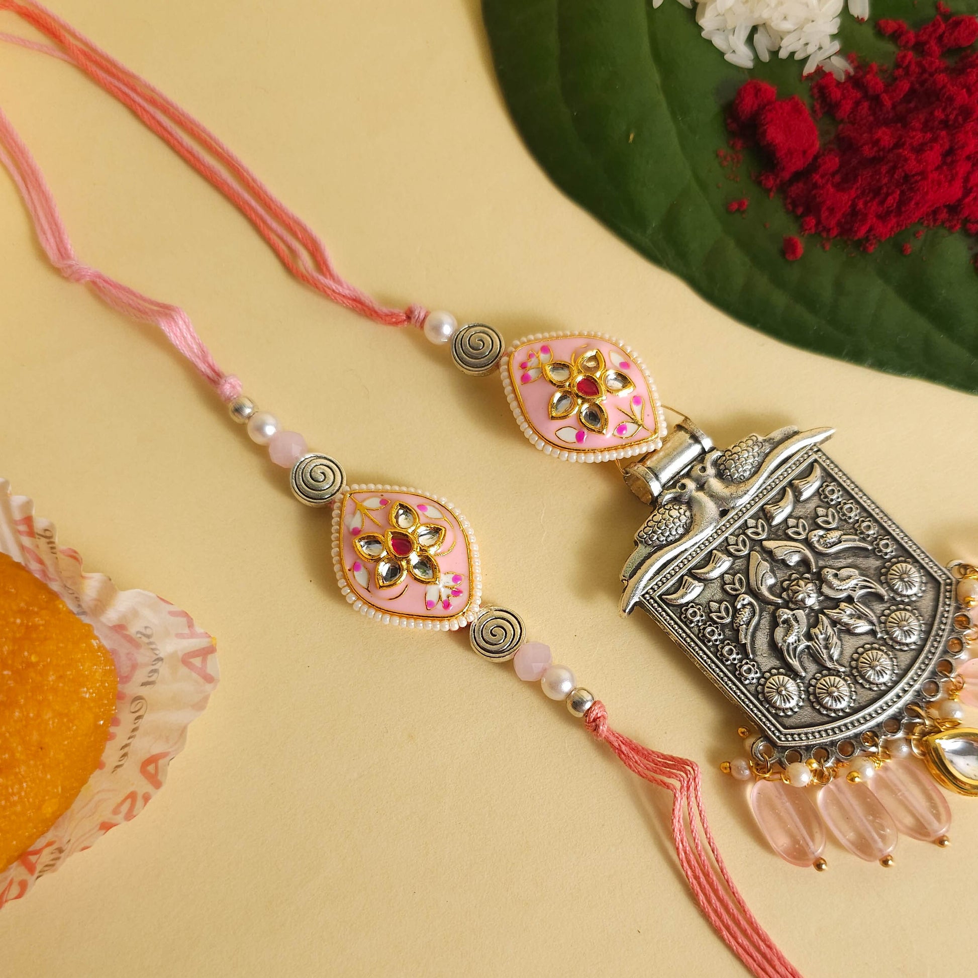 Peach Meenakari Couple Rakhi