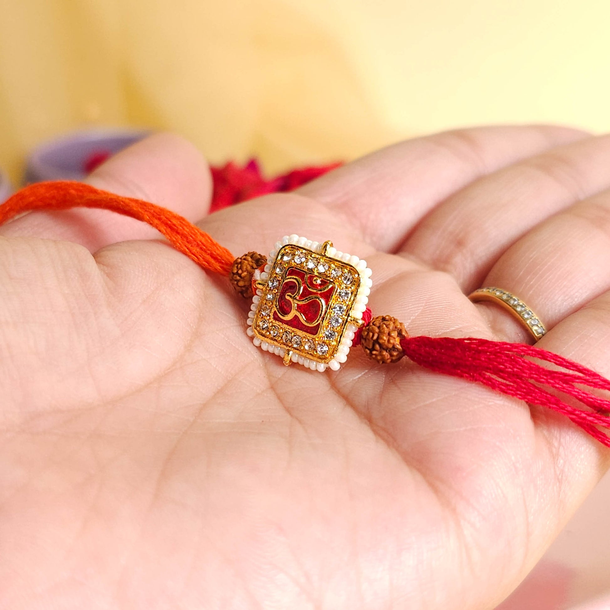 Rakhi - OM and Rudrakash
