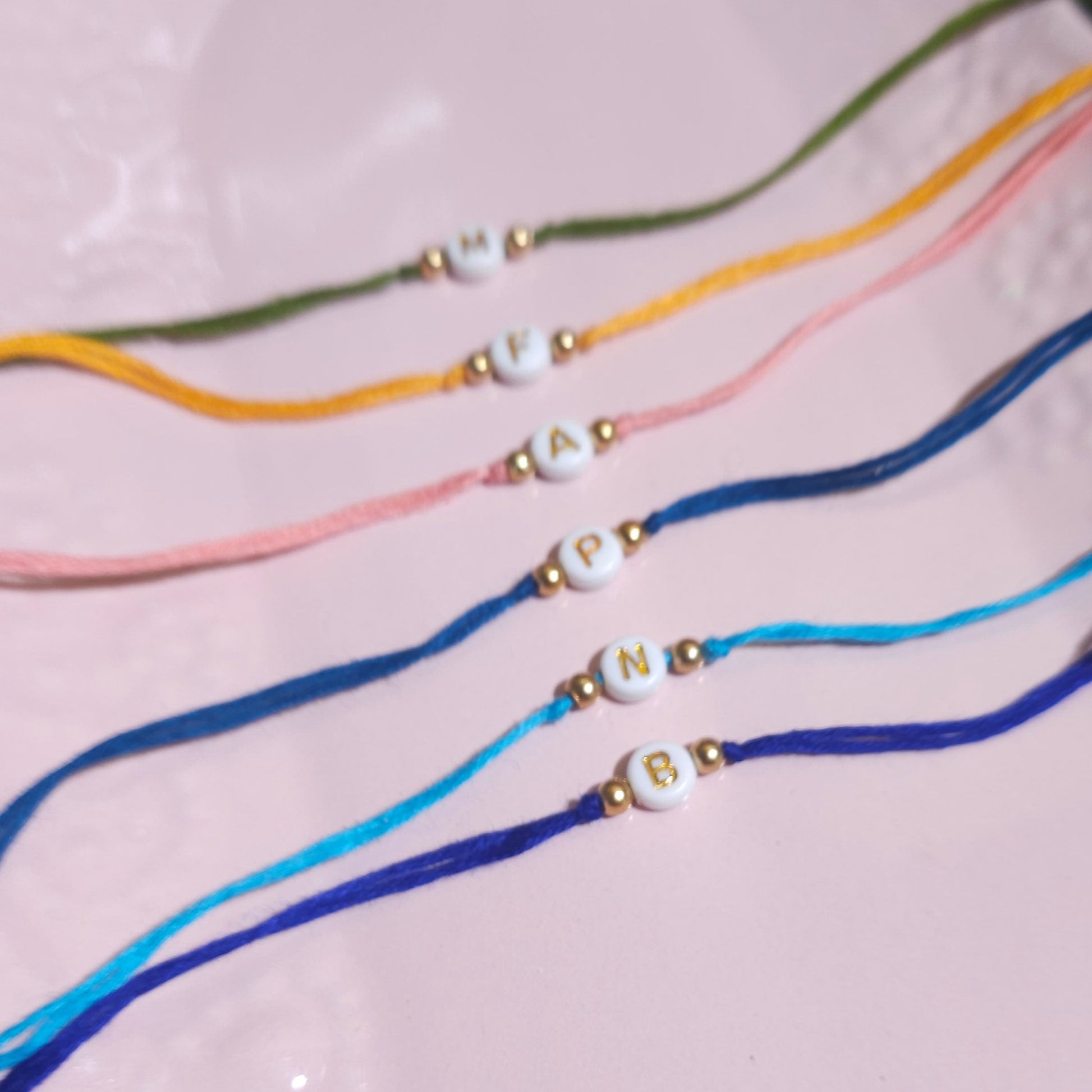 Alphabet Rakhi (set of 5)
