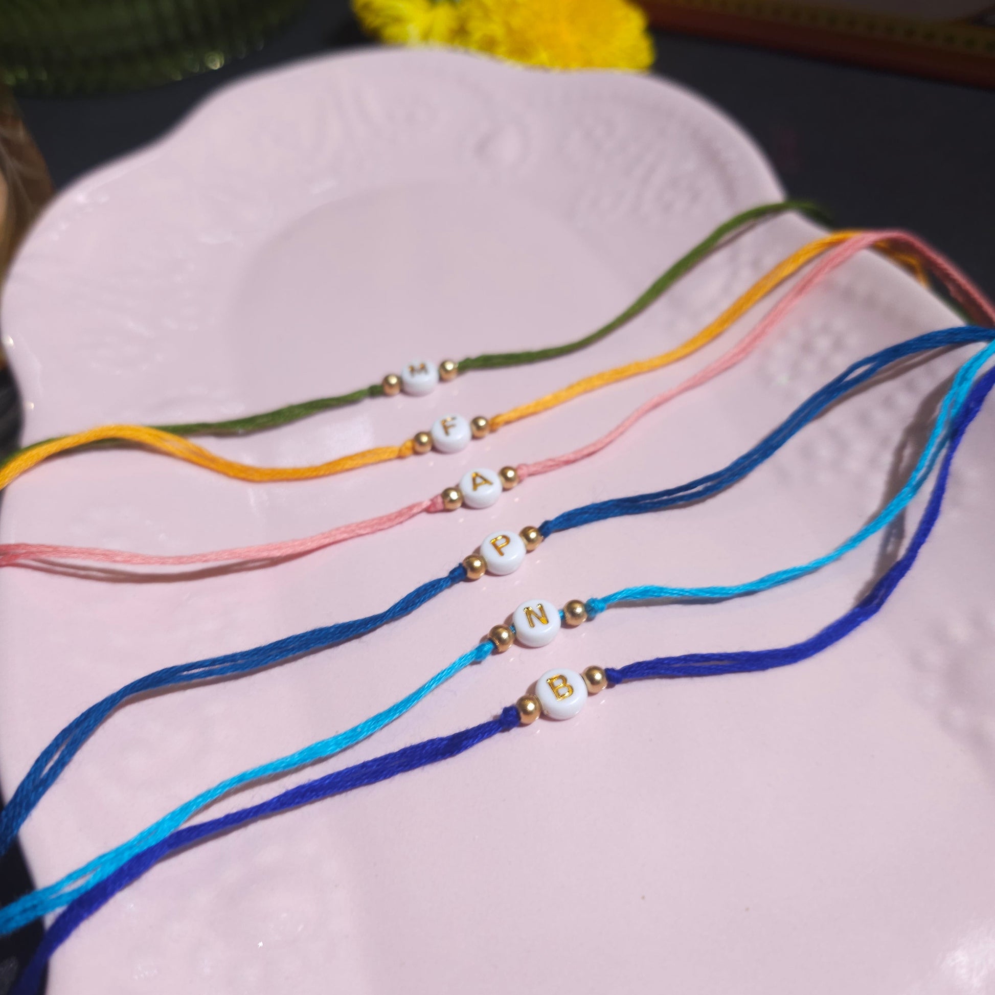 Alphabet Rakhi (set of 5)